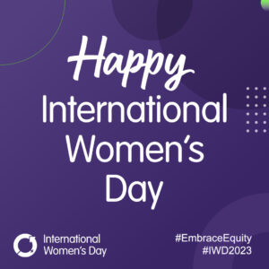 IWD logo and white wording on purple background - Happy International Women;s Day #EmraceEquity