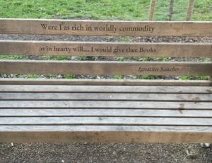 Wooden Kensington bench with a quote by Ignatius Sancho.